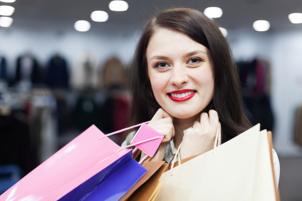 Ordinary woman with shopping bags